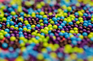 green, blue, and purple sprinkle balls