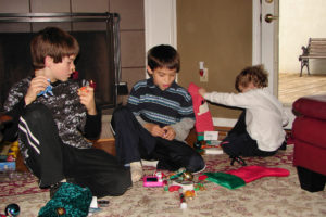 “3 boys and their stockings”